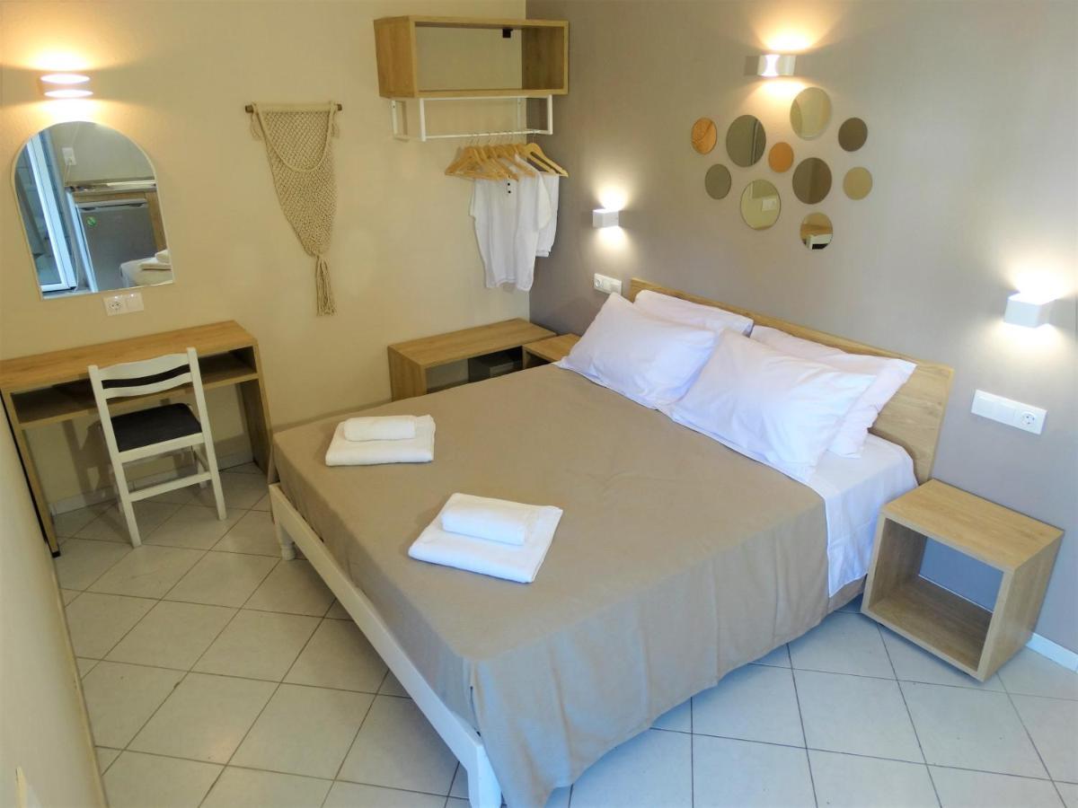 Oasis Beach Club Kavos Bagian luar foto