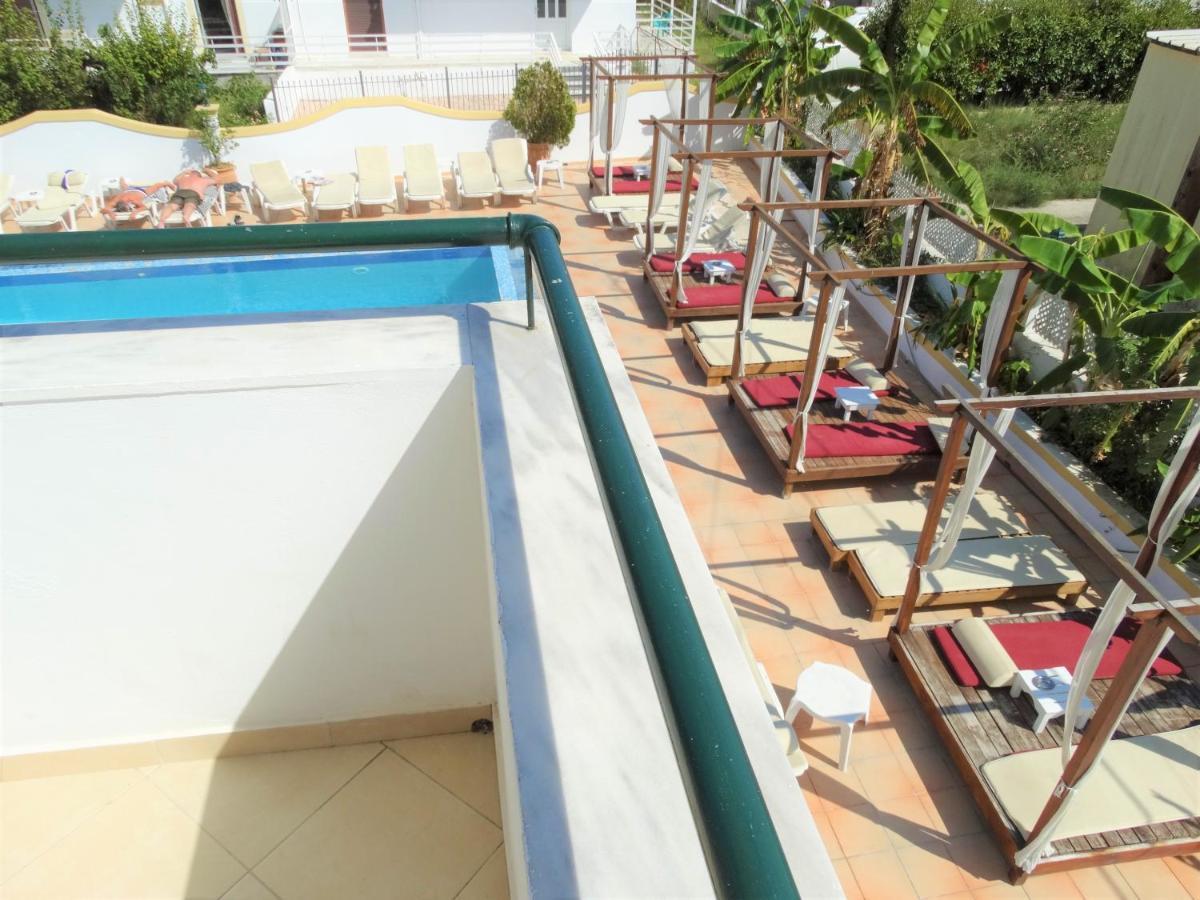 Oasis Beach Club Kavos Bagian luar foto