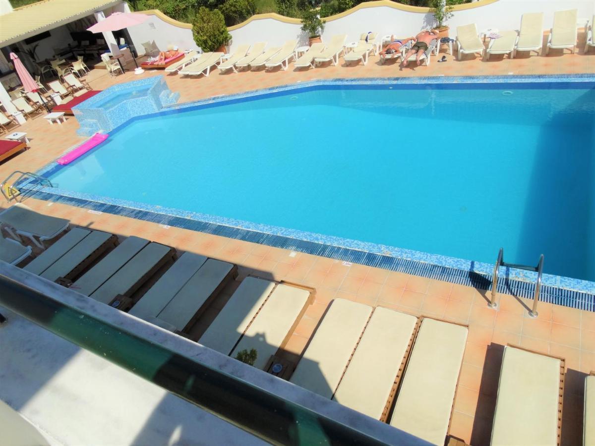 Oasis Beach Club Kavos Bagian luar foto