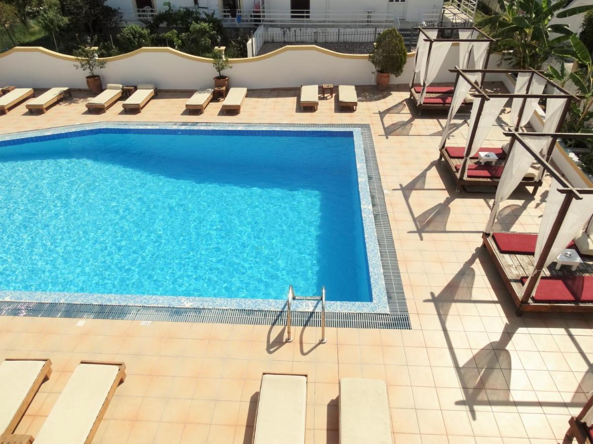 Oasis Beach Club Kavos Bagian luar foto